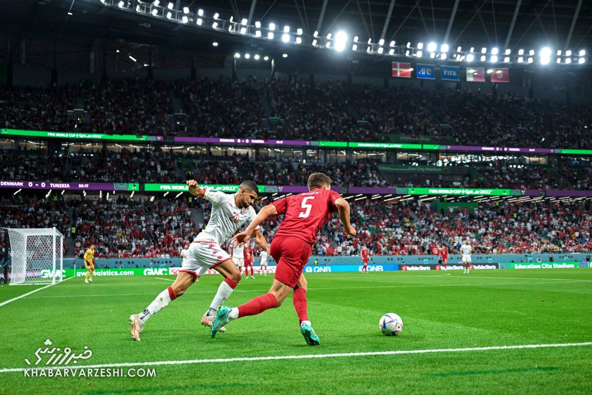 عکس| هوادار خردسال؛ سوژه جذاب جام جهانی ۲۰۲۲ قطر/ شکار عکاسان در حاشیه بازی تونس و دانمارک  