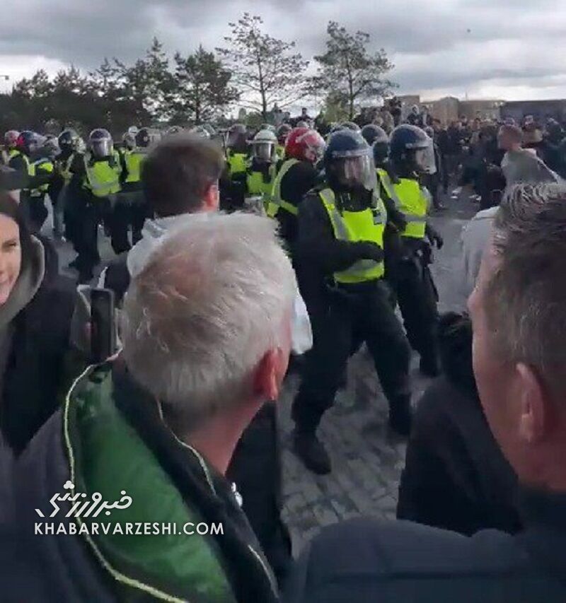 درگیری پلیس ضدشورش با هواداران میزبان +تصاویر