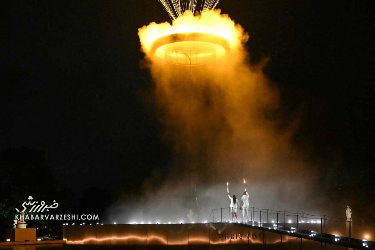 خاصترین فردی که مشعل المپیک را حمل کرد؛ قهرمان ۱۰۰ ساله و زنده فرانسه/ زن و مردی که مشعل المپیک را روشن کردند، چه کسانی بودند؟ +تصاویر