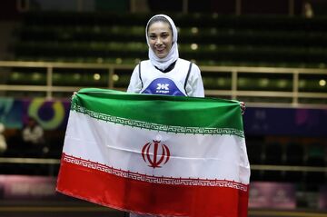 اولین طلای تکواندو به نام دختر ایرانی ضرب شد/ نمایش مقتدرانه ساینا کرمی با کسب مدال خوشرنگ +ویدیو