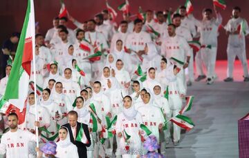 دختر ایران با ژست خاص جهانی شد/ بانوی ورزشکار در پیست رژه کانون توجه عکاسان و رسانه‌ها +عکس