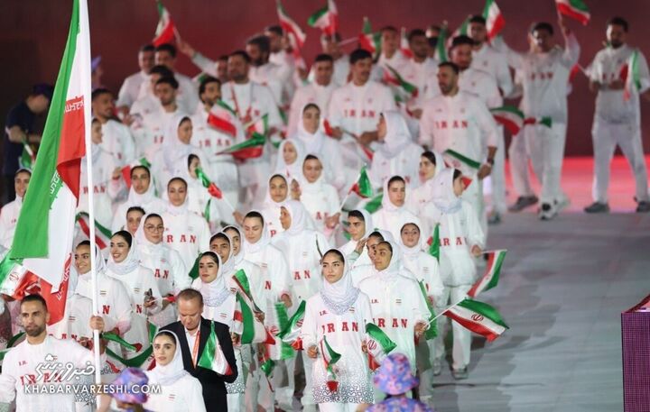 دختر ایران با ژست خاص جهانی شد/ بانوی ورزشکار در پیست رژه کانون توجه عکاسان و رسانه‌ها +عکس