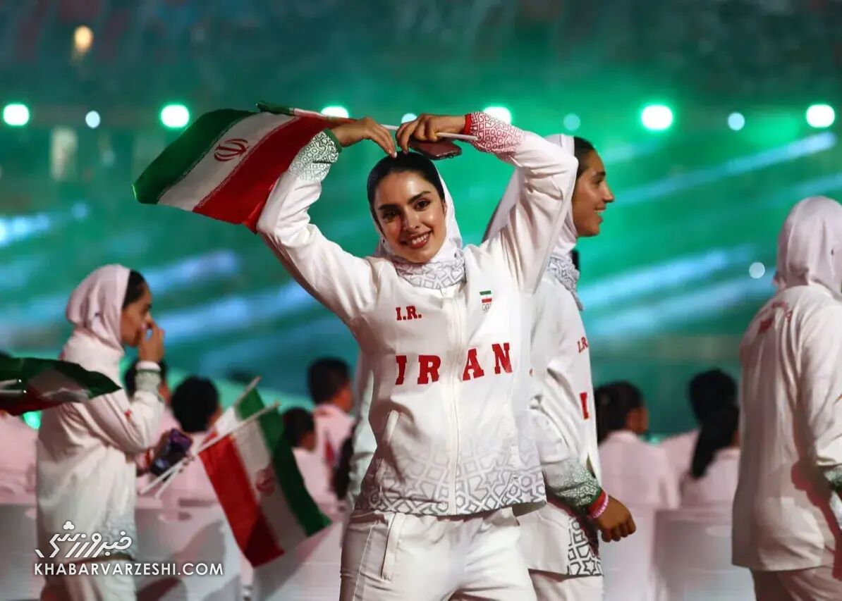 دختر ایران با ژست خاص جهانی شد/ بانوی ورزشکار در پیست رژه کانون توجه عکاسان و رسانه‌ها +عکس