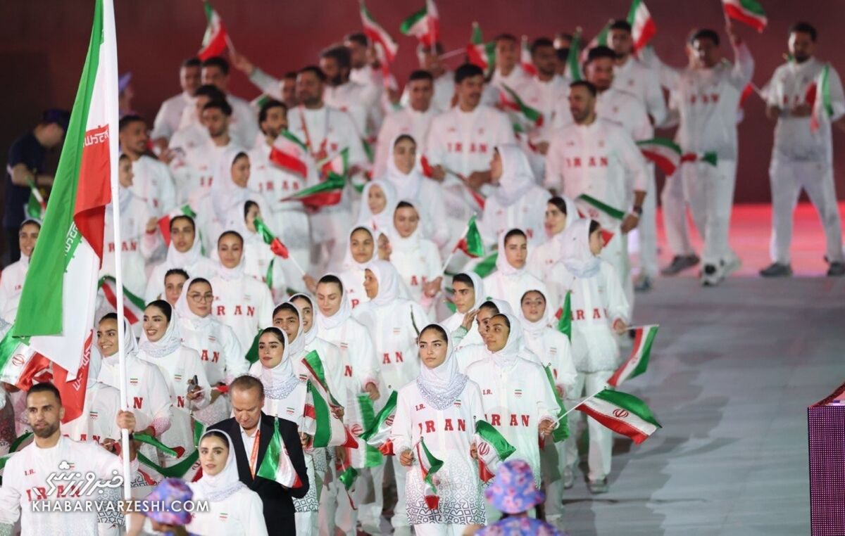 دختر ایران با نشان دادن ژست خاص جهانی شد/ بانوی ورزشکار در پیست رژه کانون توجه عکاسان و رسانه‌ها +عکس