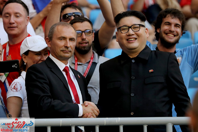 عکس| بدل پوتین و رهبر کره‌شمالی در بین هواداران