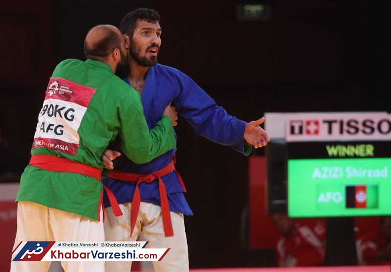 عکس| ملی پوش ایرانی برای اعتراض به داوری سرش را به دیوار کوبید!